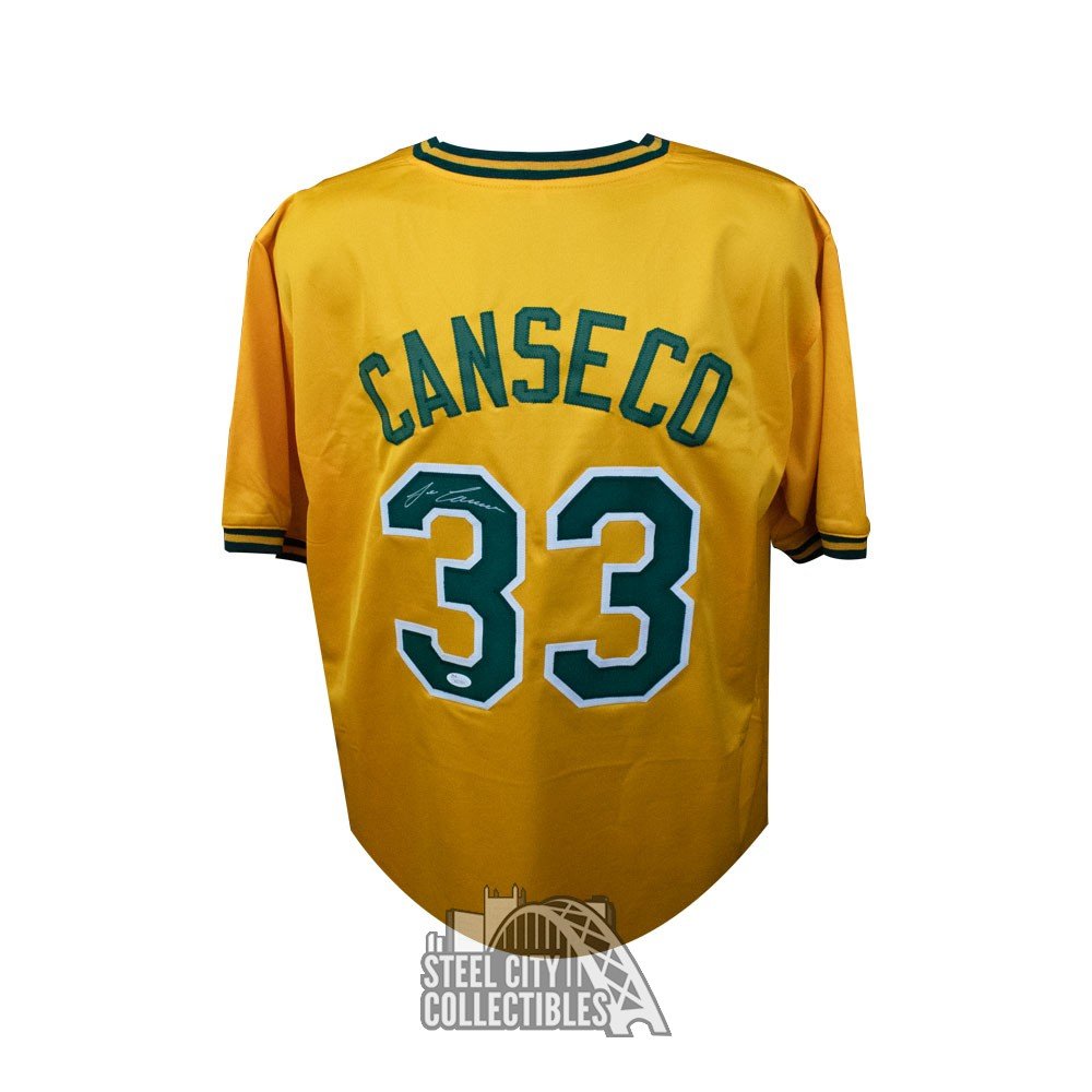Autographed/Signed Jose Canseco Oakland Yellow Baseball Jersey JSA COA