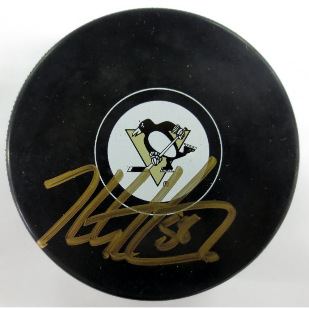 Kris purchases letang autographed puck