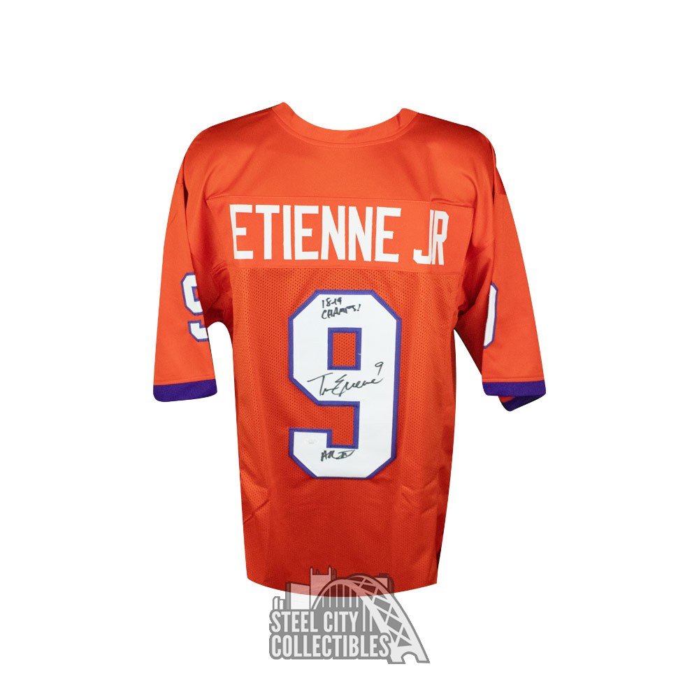 TRAVIS ETIENNE JR. SIGNED CUSTOM REPLICA JAGUARS JERSEY - BAS